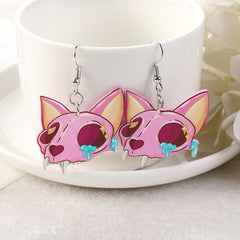 Earrings in the shape of gothic cats
