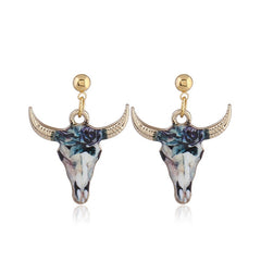 Aesthetic earrings in ethnic style with a cow head
