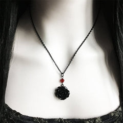 Pendant in the Gothic style with a black rose