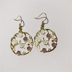 Cottagecore earrings with purple flowers