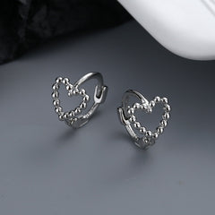 Alt style earrings in the shape of a heart
