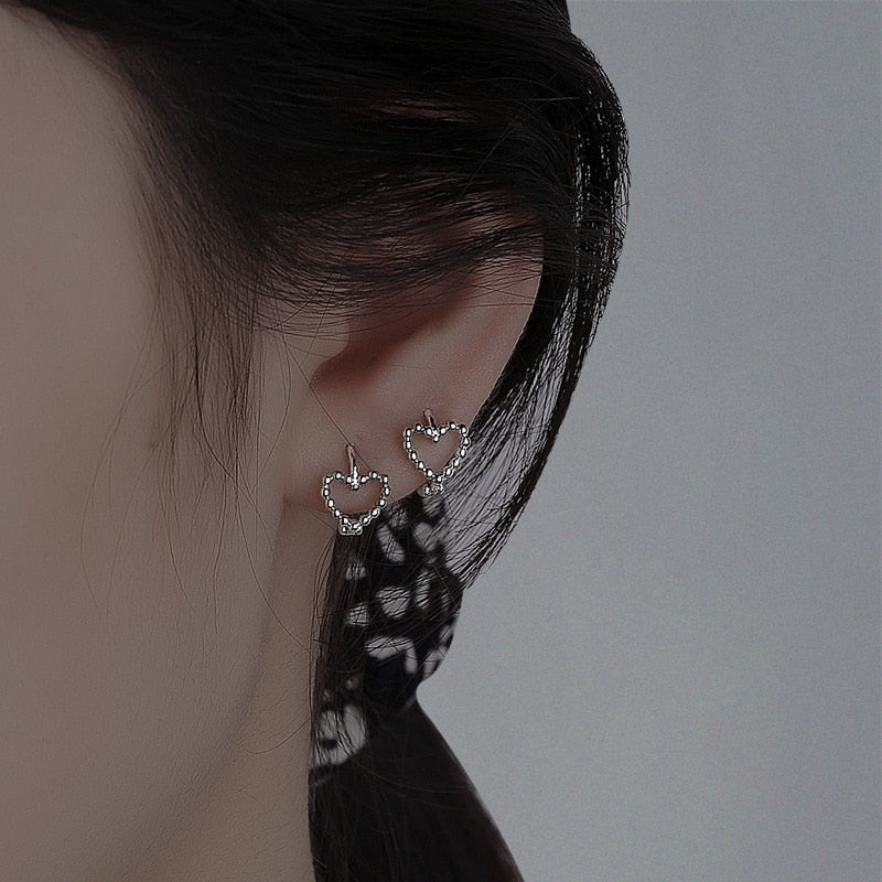 Alt style earrings in the shape of a heart